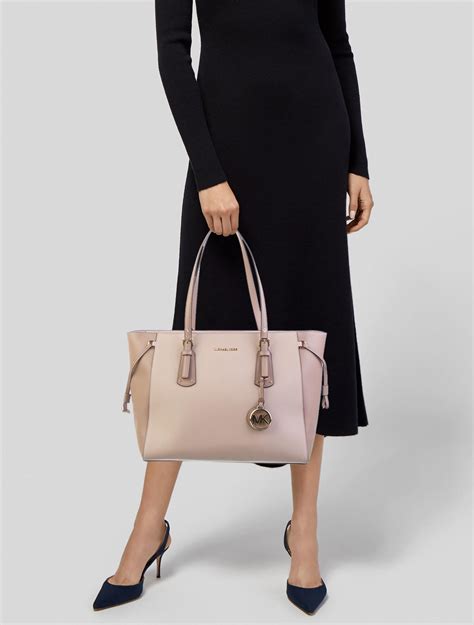 michael kors voyager medium crossgrain leather tote bag|michael kors saffiano leather bag.